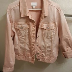 Distressed denim jacket.